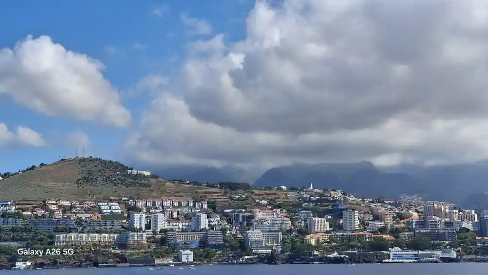 The Funchal hillside under cloud from the water