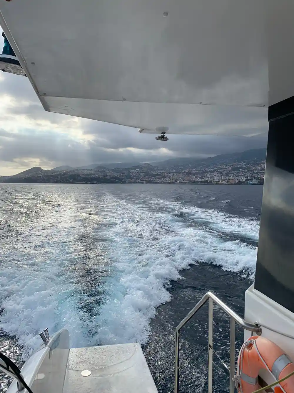 The wake and hull with the island beyond